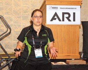 Lea Scudamore, SEO supervisor at ARI Network Services, speaks during one of her two sessions at the Powersports Business Institute @ AIMExpo in October in Orlando.